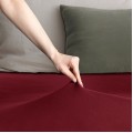Bavlněné jersey prostěradlo s gumou DecoKing Amber tmavě červené