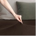 Bavlněné jersey prostěradlo s gumou DecoKing Amber čokoládové