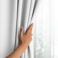 Závěs AmeliaHome Blackout s průchodkami 140x175 cm světle šedý