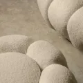 Čalouněný taburet Perugia bouclé béžový