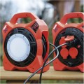 Venkovní prodlužovací kabel na bubnu Herny se 4 zásuvkami a LED reflektorem 20 m červený