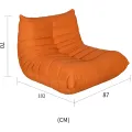 Designové křeslo Nua samet oranžové