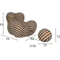 Designové křeslo Nua s podnožkou béžové/černé