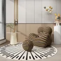 Designové křeslo Nua s podnožkou béžové/černé