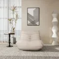 Designové křeslo Nua samet béžové