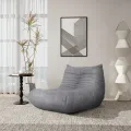 Designové křeslo Nua samet šedé