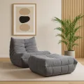 Designové křeslo Nua samet šedé