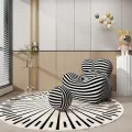 Designové křeslo Nua s podnožkou bílé/černé